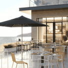 Shadowspec Oasis Cafe and Resort Center Pole umbrella with square canopy a restaurant terrace overlooking the ocean