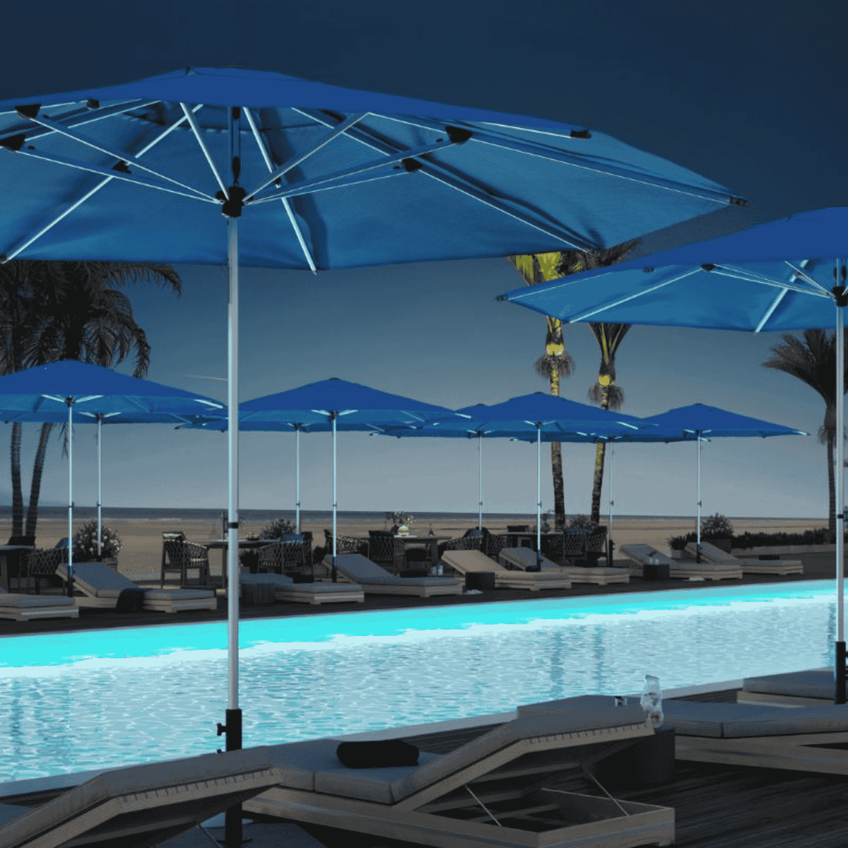 Several Shadowspec Oasis Cafe and Resort Center Pole umbrellas with blue canopy near  a resort style pool