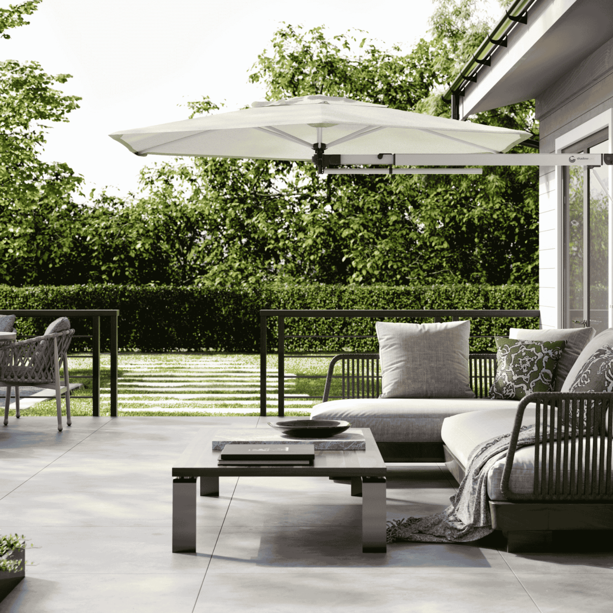 Shadowspec Retreat Wall Mounted umbrella at patio with outdoor furniture