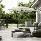Shadowspec Retreat Wall Mounted umbrella at patio with outdoor furniture