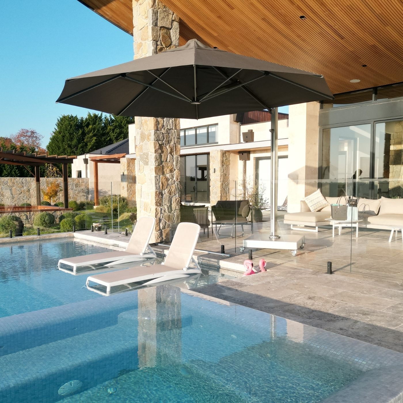 Shadowspec Serenity umbrella at residential poolside