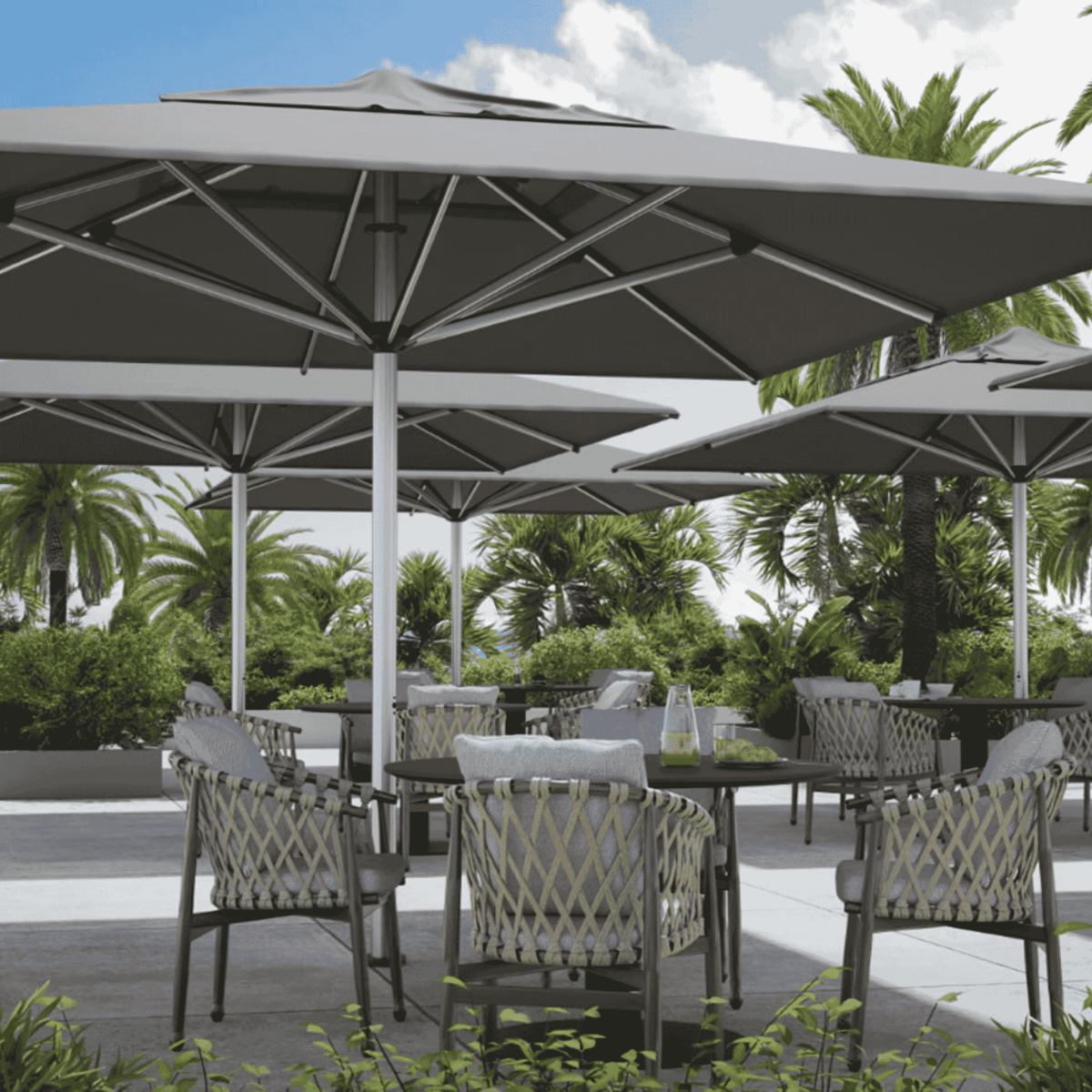 Shadowspec Commercial Center Pole Umbrella with square canopy on a restaurant terrace