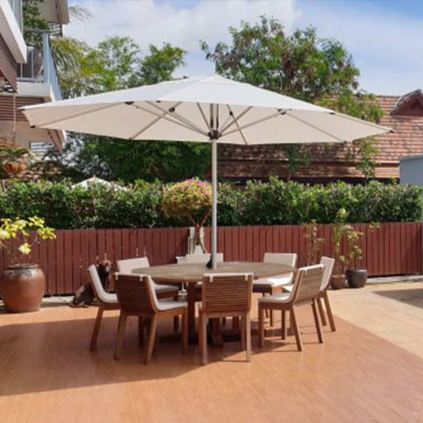 Shadowspec Oasis umbrella in a residential outdoor setting