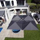 Arial view of Shadowspec Unity Quattro Multi-Canopy Cantilever umbrella in a residential setting